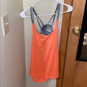 Orange open back tank with built in bra
